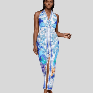Front view of the Azure Riviera Halter Maxi Dress featuring blue baroque print, halter neckline, deep front slit, and open back